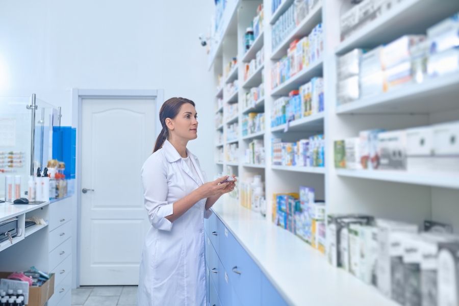 female-pharmacist-working-drugstore - 900x600.jpg