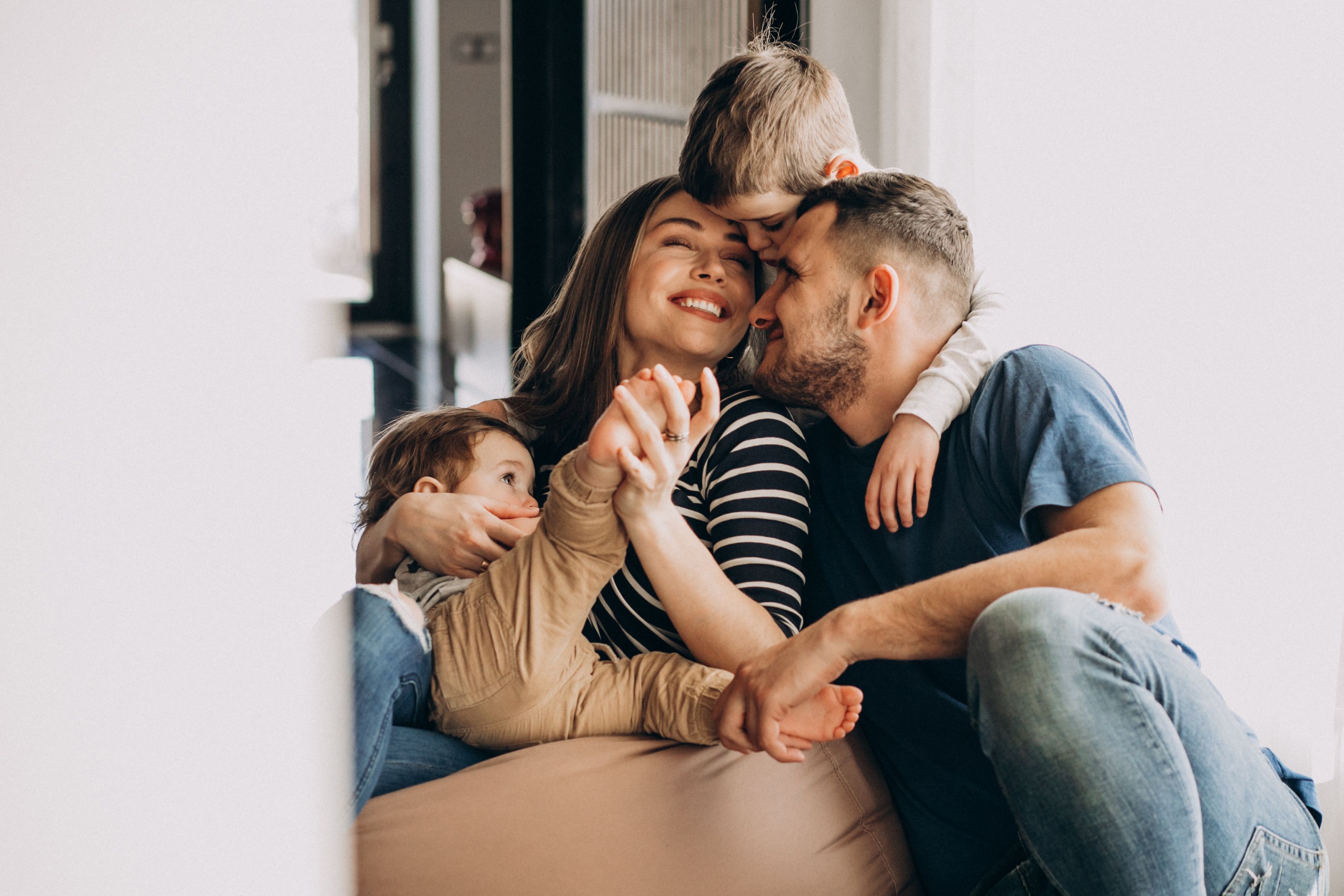 young-family-with-their-sons-at-home-having-fun.jpg